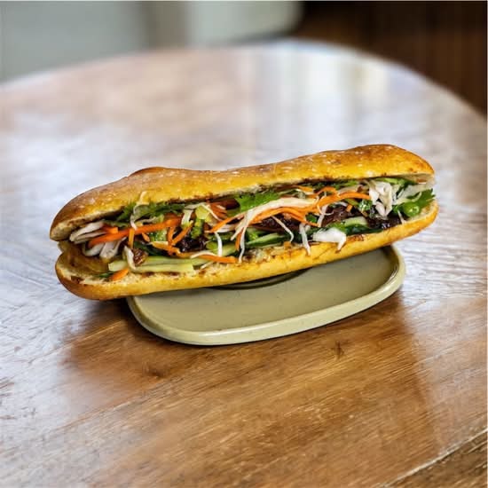 Baguette with beef flank and beef shank, basil and pickled vegetables/bánh mì bắp bò, nạm bò, húng quế, rau dưa muối