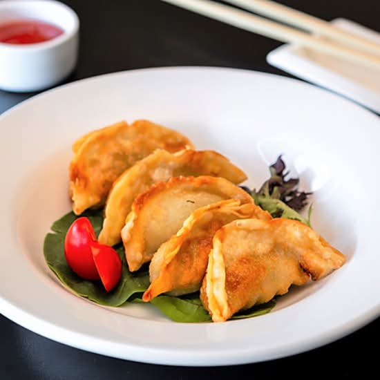 Raviolis frits au poulet (5 mcx) / Fried chicken ravioli (5 pcs)
