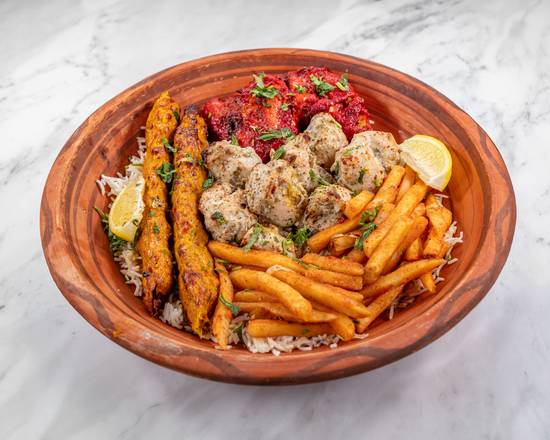 2pcs chicken or Beef Kabab/8pc Chicken Tikka/1Leg + 1 Naan/ Served with Rice, Salad, & Fries