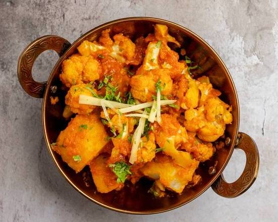 Aloo Gobhi(Served with Free Naan or Rice or Roti)