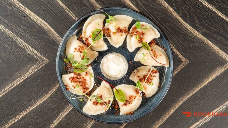 6 X Homemade Pierogies ( old cheddar cheese and potato )