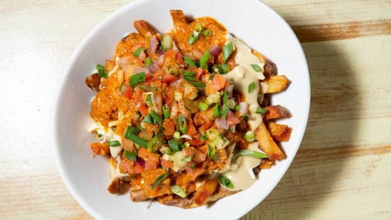 Butter Chikkin Poutine ◊