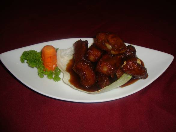 18. Côtes Levées au Miel / Honey Spare Ribs (16 oz.)