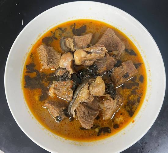 Nigerian goat meat pepper soup and plantain