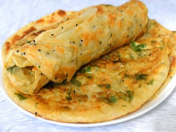 Egg Paratha + Dahi 4 Oz + Mixed pickle + 4 oz. Dahi