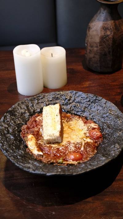 Eggs poached in tomato sauce
