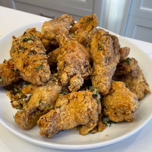 Salty pepper chicken wings with vegetables fried rice