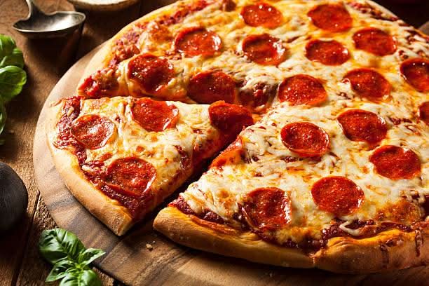 #2  One Medium Pizza(2 Toppings), 1 Lasagna, 10 Chicken Wings, 1 Garden Salad, 1 Garlic Toast
