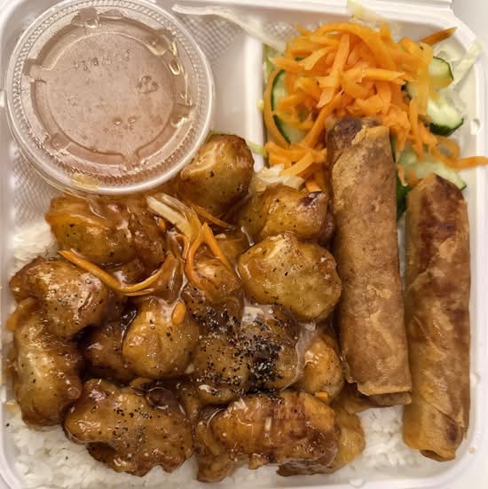 25. Sweet-and-Sour Chicken with Pork Spring Rolls (2 pcs) Entree