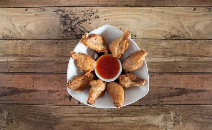 U7. Signature Crispy Wings (8pcs)