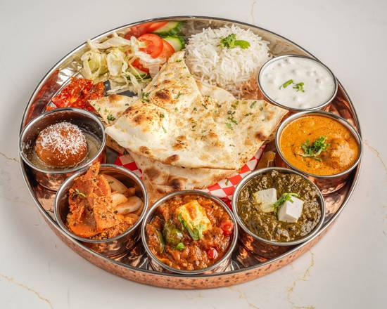 3 Veg, Raita, Rice, Naan or Roti, Salad, Dessert