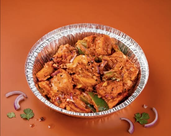 Soya Chaap - Finely Cut Soya Chunks with Red Onion and Green Peppers.