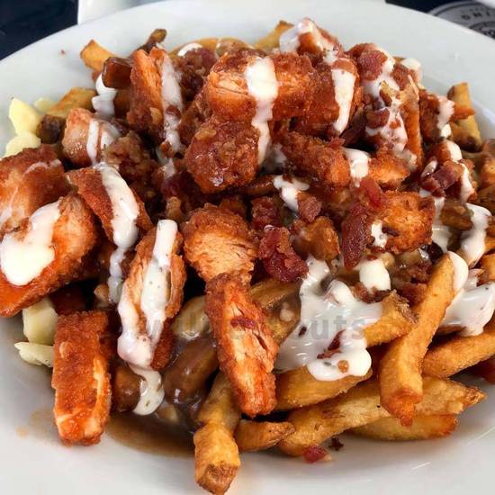 Buffalo Chicken Poutine - Fries, Cheese, Curds, Poutine, Fried Chicken with Buffalo Sauce, Green Onion, Ranch Sauce