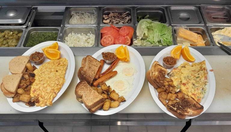 Two eggs with toast and Home fries