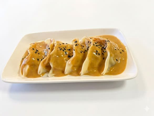 Dumpling Poulet sauce Arachide
