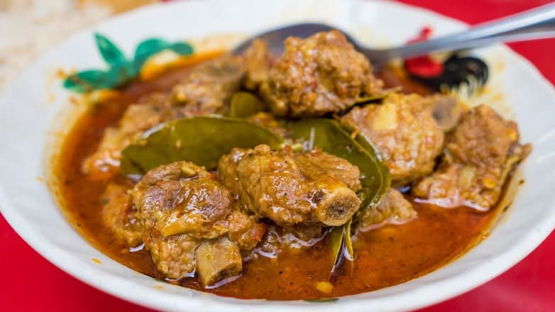 PORK ( rib) CURRY WITH RICE & JERK PORK (8OZ)