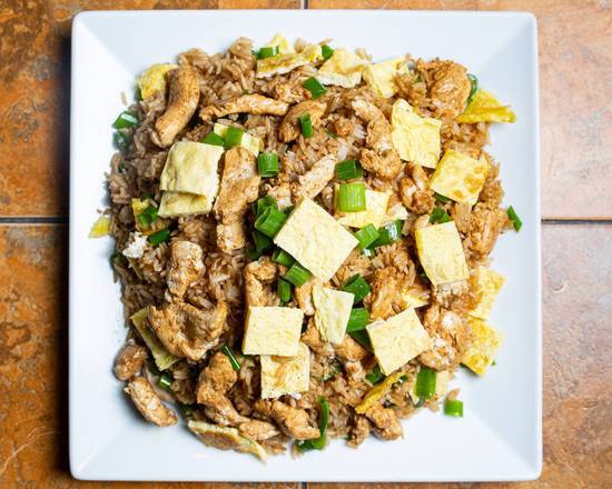Arroz Chaufa (pollo ó carne)