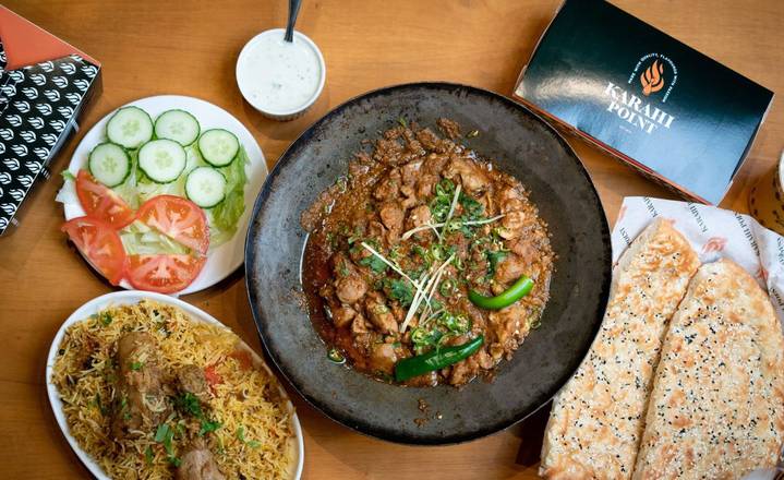 Combo 1 (Half chicken karahi, 2 nan, chicken biryani, 2 pop)