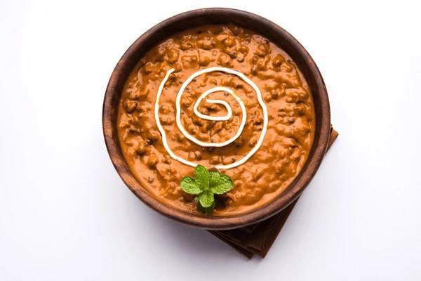 Dal Makhani (w. Rice OR Plain Naan)