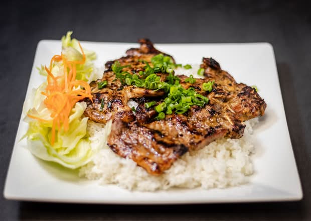 2 Pork Chop on Steamed Rice