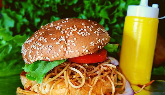 DESI CHICKEN NOODLE BURGER