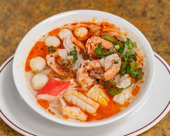 49. Hot and Sour Seafood with Rice Noodle (Spicy) - Pho Hai San Chua Cay
