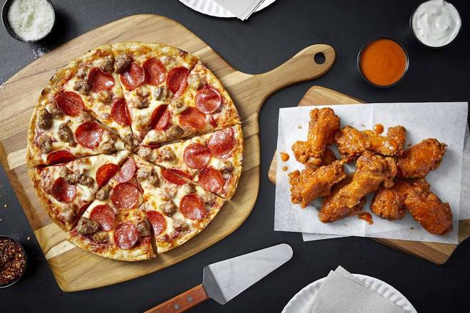 Family Deal 1( 1 pizza, 10 wings, wedges pop and dipping sauce)