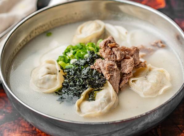 Korean Traditional Meat Dumpling Soup with Sliced Rice Cakes (떡만두국)