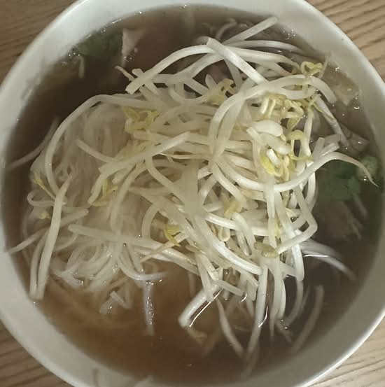8. Rice Noodles with Eye Round Steak, Well Done Flank, Soft Tendon, and Beef Tripe (Pho tai, nam, gan, sach) (Large)