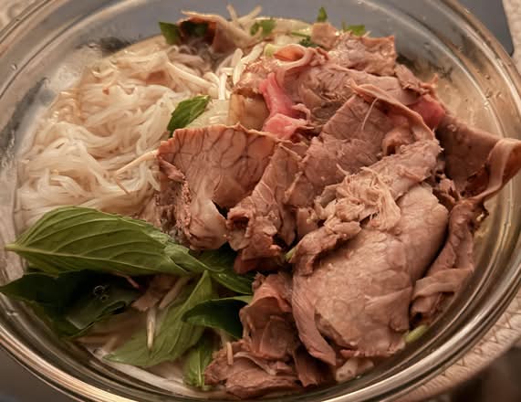 5. Rice Noodles with Eye Round Steak, Well Done Flank, and Fatty Brisket (Pho tai, nam, gau) (Large)