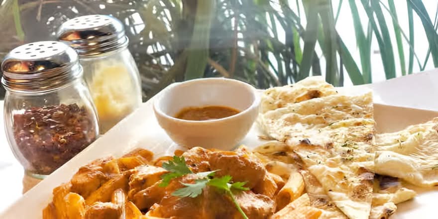Butter Chicken Pasta W/ G. Naan