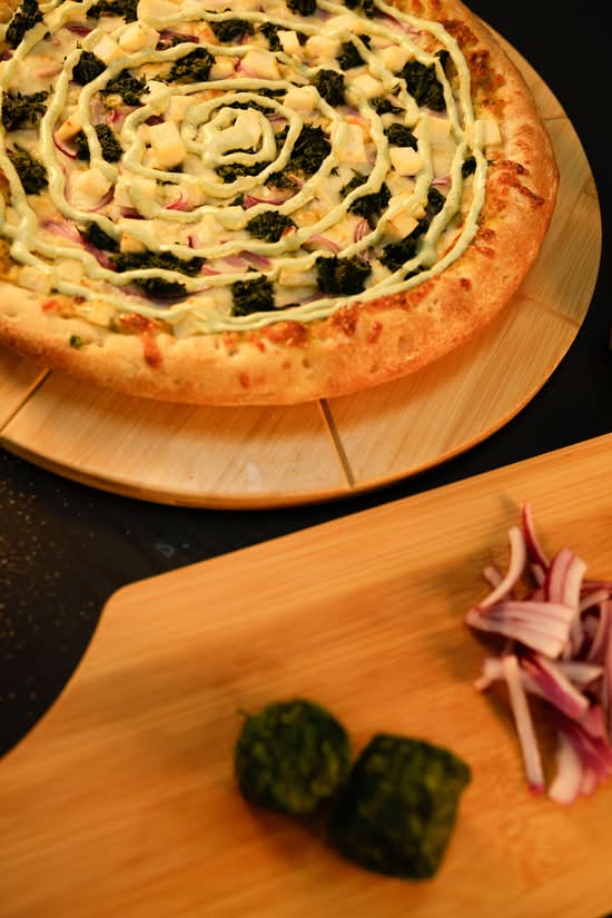 Palak Paneer/Chiken Pizza