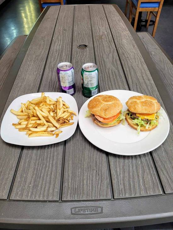 Two Cheese Burgers W/ Fries & Two Cans of Pops