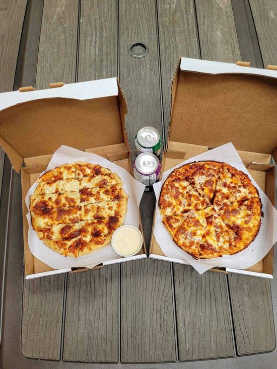 Medium Two Topping Pizza, Medium Garlic Cheese Sticks, and Two Cans of Pops