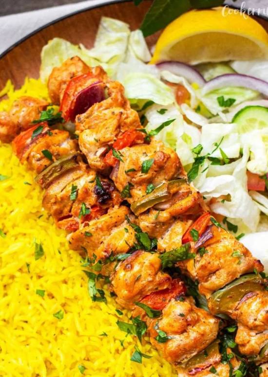 Santorini Chicken souvlaki, rice , Greek salad