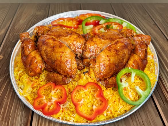 # 2 POULETS ENTIERS Sur Riz