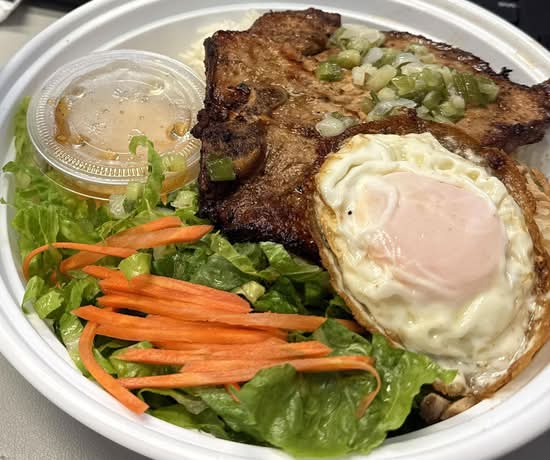 57. Charbroil Pork Chop (1pcs) Shredded Pork , and 1 Fried egg