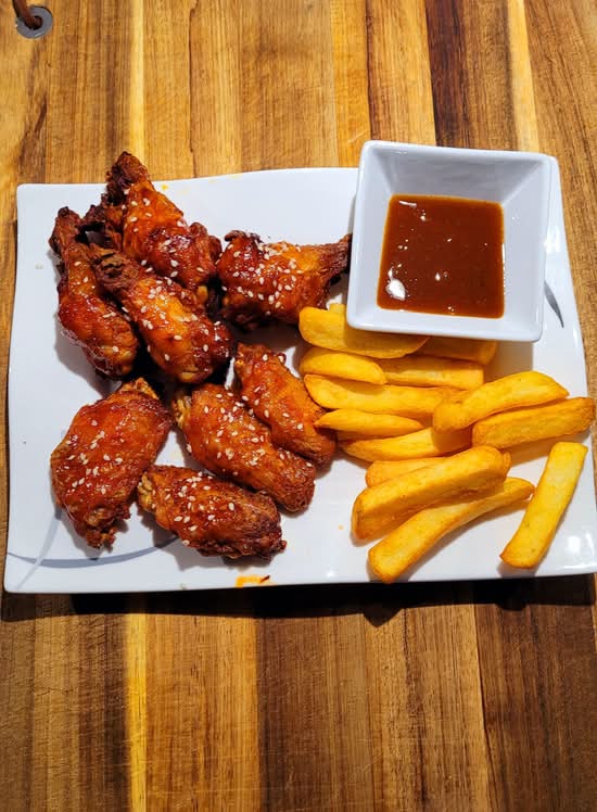 10 Wings + Fries + Can of Pop